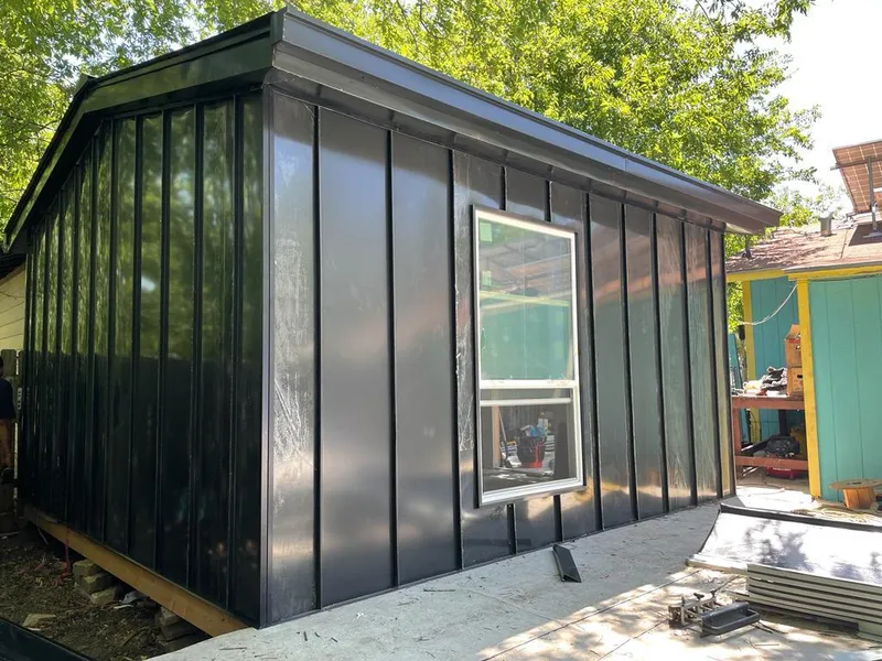 Black standing seam metal wall panels for Roof Inspection in Waipio Acres